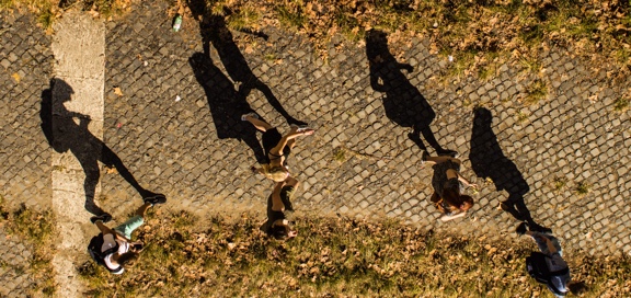Students walking on sidewalk, view from above